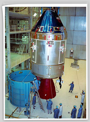 Interior view of the Kennedy Space Center's (KSC) Manned Spacecraft Operations Building showing Apollo Spacecraft 107 Command and Service Modules (CSM) being moved from work stand 134 for mating to Spacecraft Lunar Module Adapter (SLA) 14.